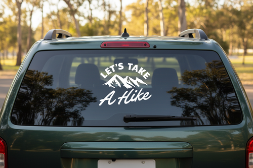  white graphic with mountain silhouette and 'Let's Take A Hike' text